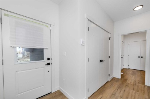 124 Heritage Boulevard, Cochrane, AB - Indoor Photo Showing Other Room