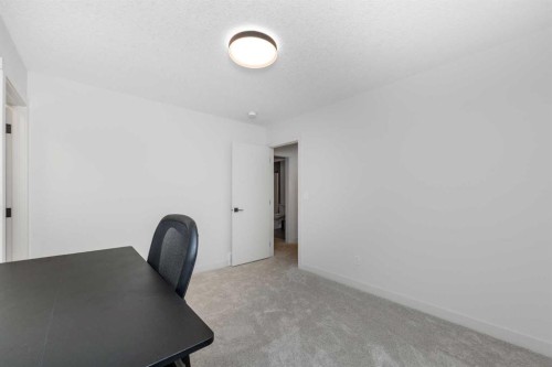 124 Heritage Boulevard, Cochrane, AB - Indoor Photo Showing Office