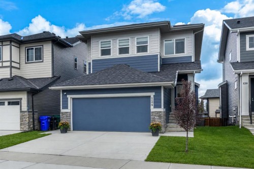 124 Heritage Boulevard, Cochrane, AB - Outdoor With Facade