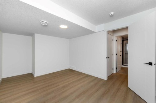 124 Heritage Boulevard, Cochrane, AB - Indoor Photo Showing Other Room