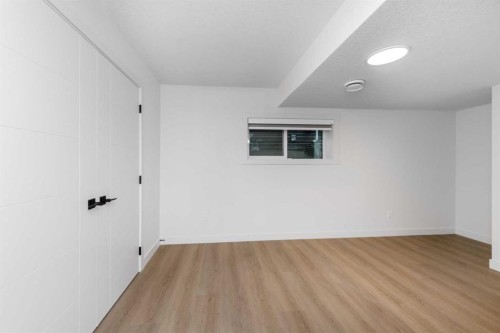 124 Heritage Boulevard, Cochrane, AB - Indoor Photo Showing Other Room