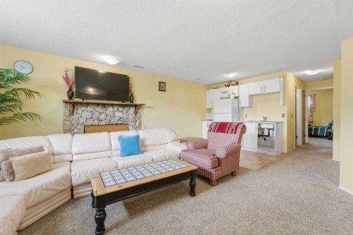 96 Falshire Close Ne, Calgary, AB - Indoor Photo Showing Living Room