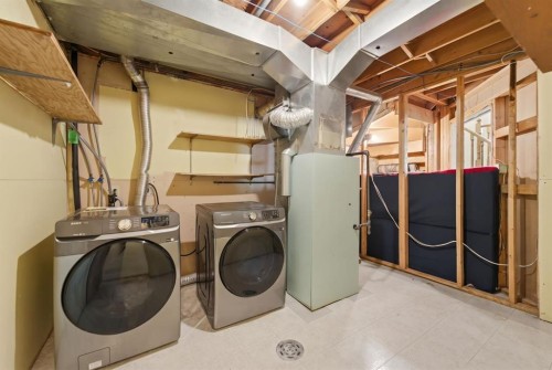 96 Falshire Close Ne, Calgary, AB - Indoor Photo Showing Laundry Room