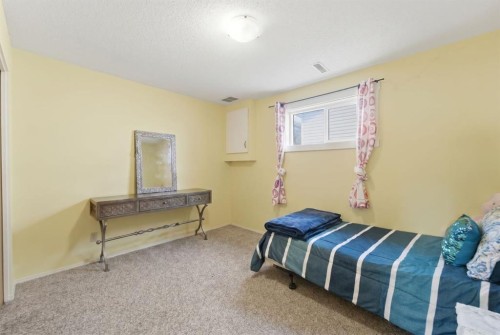 96 Falshire Close Ne, Calgary, AB - Indoor Photo Showing Bedroom
