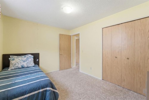 96 Falshire Close Ne, Calgary, AB - Indoor Photo Showing Bedroom
