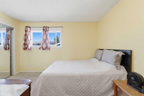 96 Falshire Close Ne, Calgary, AB - Indoor Photo Showing Bedroom
