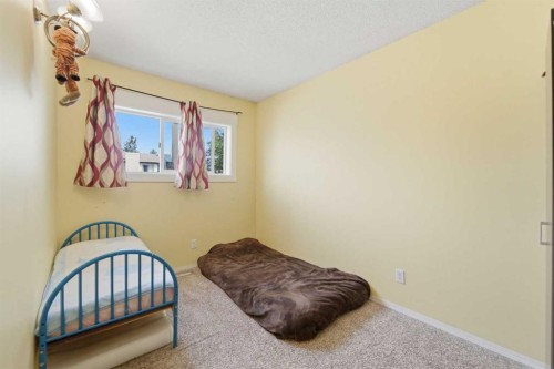 96 Falshire Close Ne, Calgary, AB - Indoor Photo Showing Bedroom