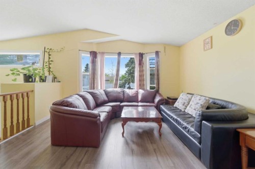 96 Falshire Close Ne, Calgary, AB - Indoor Photo Showing Living Room