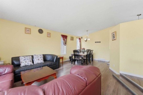 96 Falshire Close Ne, Calgary, AB - Indoor Photo Showing Living Room
