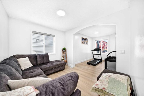 218 Saddlefield Place Ne, Calgary, AB - Indoor Photo Showing Living Room