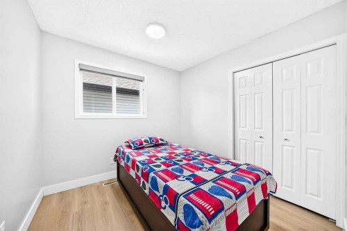 218 Saddlefield Place Ne, Calgary, AB - Indoor Photo Showing Bedroom