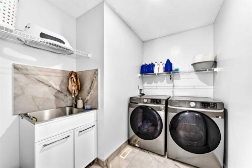 218 Saddlefield Place Ne, Calgary, AB - Indoor Photo Showing Laundry Room