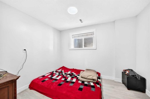 218 Saddlefield Place Ne, Calgary, AB - Indoor Photo Showing Bedroom