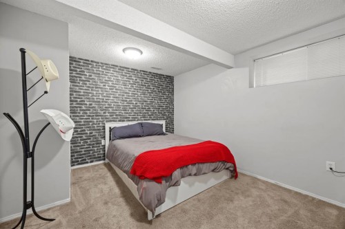 624 Cranston Drive Se, Calgary, AB - Indoor Photo Showing Bedroom