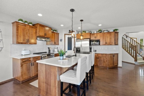 624 Cranston Drive Se, Calgary, AB - Indoor Photo Showing Kitchen With Double Sink
