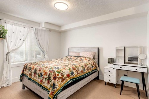 132-500 Rocky Vista Gardens Nw, Calgary, AB - Indoor Photo Showing Bedroom