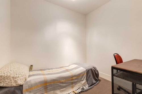 132-500 Rocky Vista Gardens Nw, Calgary, AB - Indoor Photo Showing Bedroom