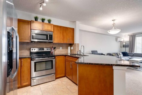132-500 Rocky Vista Gardens Nw, Calgary, AB - Indoor Photo Showing Kitchen With Stainless Steel Kitchen