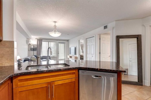 132-500 Rocky Vista Gardens Nw, Calgary, AB - Indoor Photo Showing Kitchen With Double Sink
