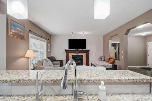 509 New Brighton Drive Se, Calgary, AB - Indoor With Fireplace