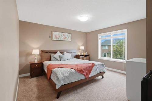 509 New Brighton Drive Se, Calgary, AB - Indoor Photo Showing Bedroom