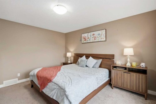 509 New Brighton Drive Se, Calgary, AB - Indoor Photo Showing Bedroom