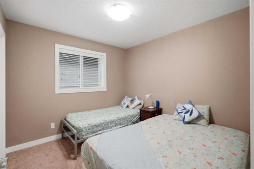 509 New Brighton Drive Se, Calgary, AB - Indoor Photo Showing Bedroom