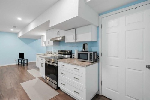 509 New Brighton Drive Se, Calgary, AB - Indoor Photo Showing Kitchen