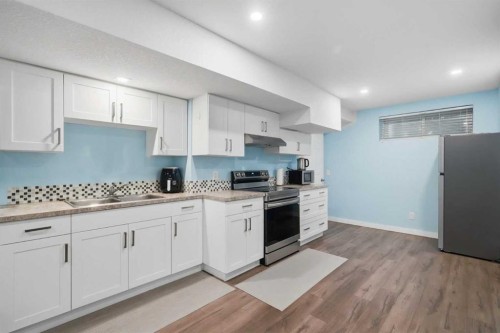 509 New Brighton Drive Se, Calgary, AB - Indoor Photo Showing Kitchen