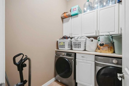 509 New Brighton Drive Se, Calgary, AB - Indoor Photo Showing Laundry Room