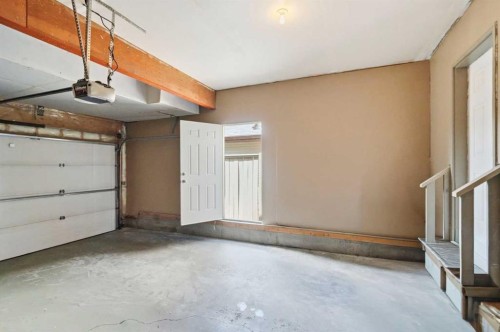 509 New Brighton Drive Se, Calgary, AB - Indoor Photo Showing Garage