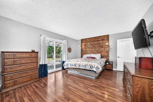 31 Taylor Way Se, Airdrie, AB - Indoor Photo Showing Bedroom
