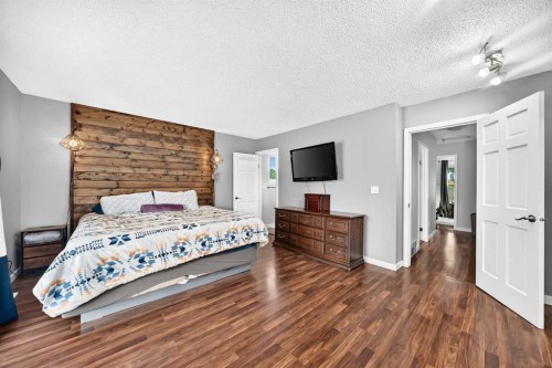 31 Taylor Way Se, Airdrie, AB - Indoor Photo Showing Bedroom