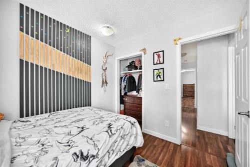 31 Taylor Way Se, Airdrie, AB - Indoor Photo Showing Bedroom