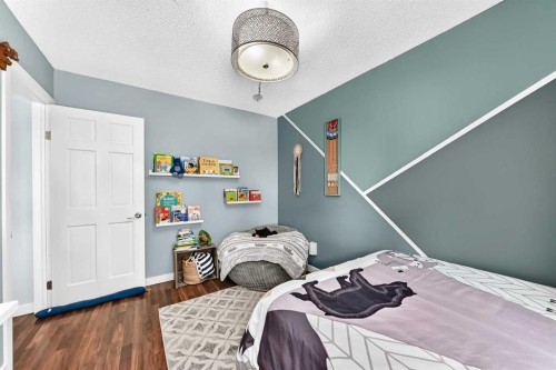 31 Taylor Way Se, Airdrie, AB - Indoor Photo Showing Bedroom