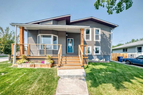 31 Taylor Way Se, Airdrie, AB - Outdoor With Deck Patio Veranda