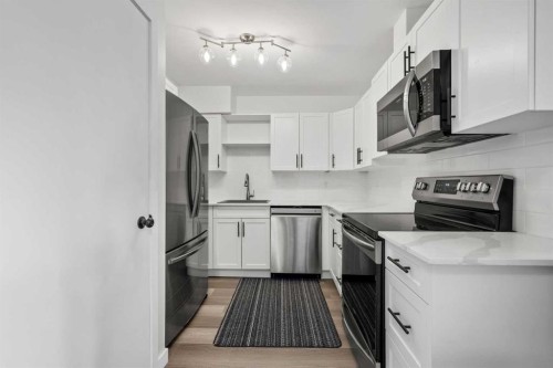 40-3809 45 Street Sw, Calgary, AB - Indoor Photo Showing Kitchen With Stainless Steel Kitchen With Upgraded Kitchen