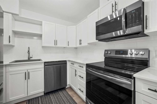 40-3809 45 Street Sw, Calgary, AB - Indoor Photo Showing Kitchen With Upgraded Kitchen