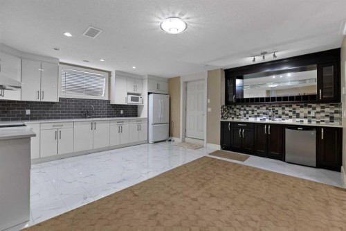 21 Saddlelake Lane Ne, Calgary, AB - Indoor Photo Showing Kitchen With Upgraded Kitchen
