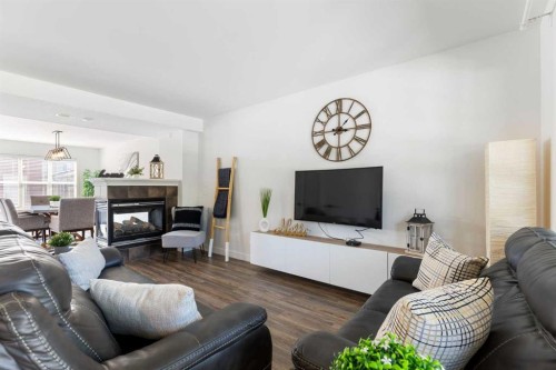 17 Auburn Bay View Se, Calgary, AB - Indoor Photo Showing Living Room With Fireplace