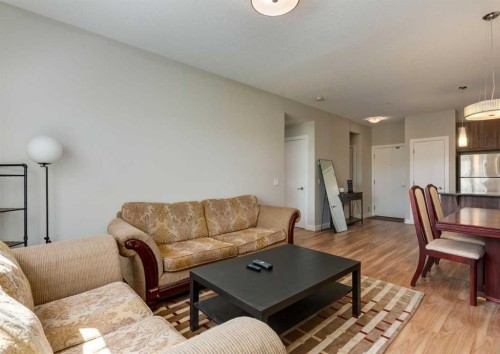 7-4 Sage Hill Terrace Nw, Calgary, AB - Indoor Photo Showing Living Room