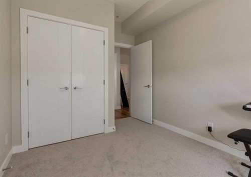 7-4 Sage Hill Terrace Nw, Calgary, AB - Indoor Photo Showing Other Room