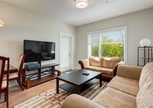 7-4 Sage Hill Terrace Nw, Calgary, AB - Indoor Photo Showing Living Room
