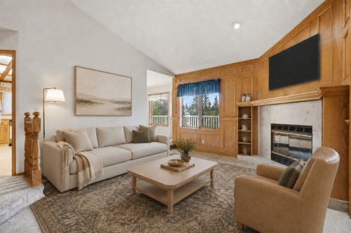 37 Edgeview Road Nw, Calgary, AB - Indoor Photo Showing Living Room With Fireplace