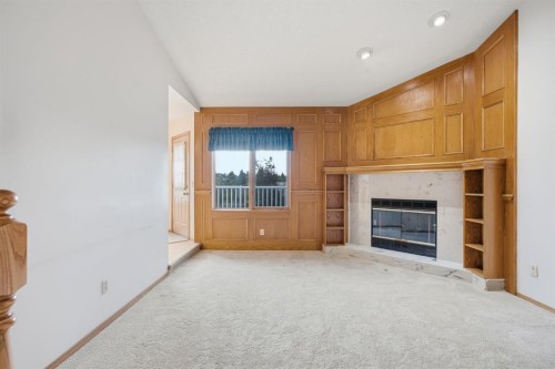 37 Edgeview Road Nw, Calgary, AB - Indoor With Fireplace