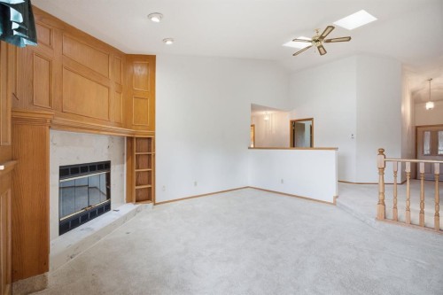 37 Edgeview Road Nw, Calgary, AB - Indoor With Fireplace