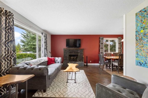 8419 Silver Springs Road Nw, Calgary, AB - Indoor Photo Showing Living Room With Fireplace