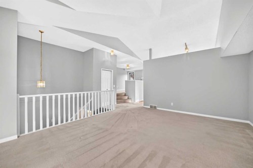23 Sunlake Gardens Se, Calgary, AB - Indoor Photo Showing Other Room
