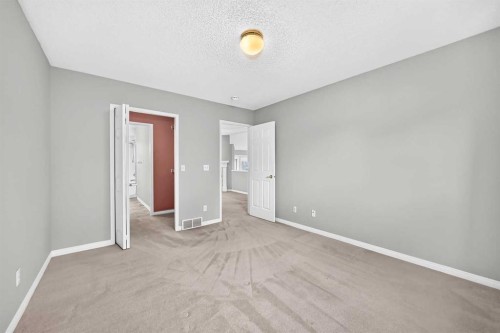 23 Sunlake Gardens Se, Calgary, AB - Indoor Photo Showing Other Room