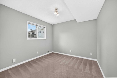 23 Sunlake Gardens Se, Calgary, AB - Indoor Photo Showing Other Room